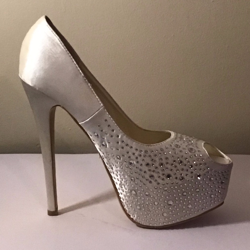 White peep toe, sparkling platform.